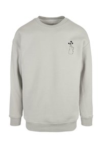 Light gray sweatshirt with a crew neck, featuring a black outline of a vase with flowers on the left chest. Smooth texture and relaxed fit.