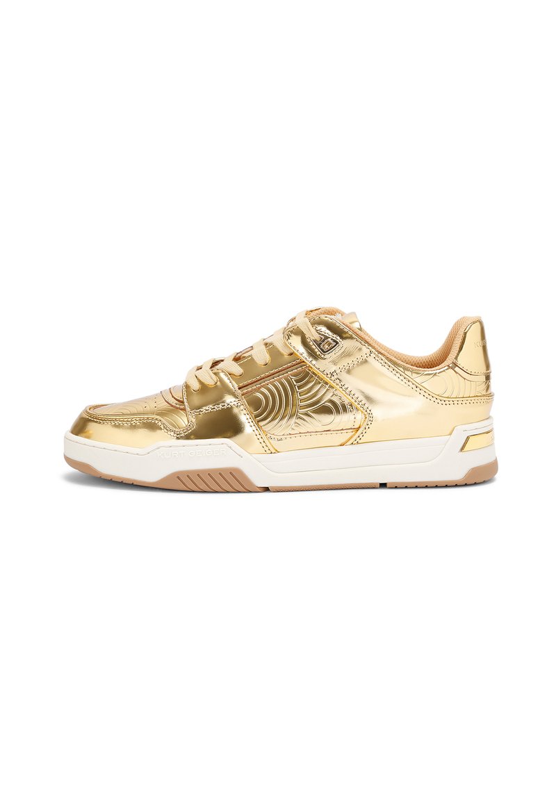 Goldene Sneaker