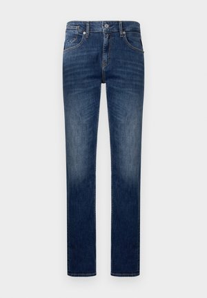 Donkerblauwe denim jeans met een recht model, voorzien van vijf zakken, contrasterende stiksels en een ritssluiting.