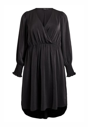 Vestido negro de manga larga con escote en V, cintura fruncida, hombros abullonados y puños fruncidos, que presenta un dobladillo ligeramente curvado.