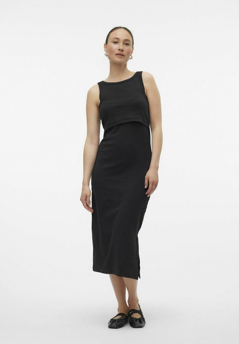 Must värv, ilma varrukateta midi kleit, millel on vormitud bodice ja külgauk. Valmistatud pehmest ja siledast kangast, millel on lihtne ja puhas disain.
