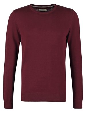 Burgundski pulover s okruglim izrezom izrađen od glatkog materijala, s dugim rukavima i rebrastim manžetama i donjim rubom za dodatnu teksturu.