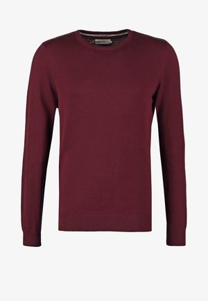 Jersey de cuello redondo burdeos hecho de tela suave, con mangas largas y puños y dobladillo acanalados para mayor textura.