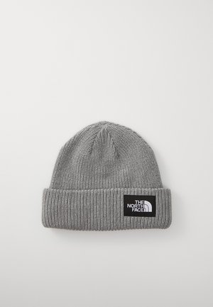 Gray knit beanie hat with a folded cuff, featuring a black rectangle patch with white lettering logo on the side. Textured ribbed design.