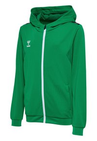 Grøn hættetrøje med lynlås lavet af tekstureret stof, med hvid lynlås, to sidelommer og sorte detaljer på skuldrene. Indeholder Hummel-logo.