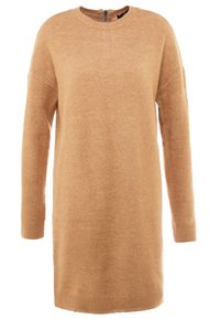 Robe pull en tricot brun clair avec manches longues, encolure ronde et fermeture éclair au dos. Texture douce et coupe décontractée, arrivant à mi-cuisse.