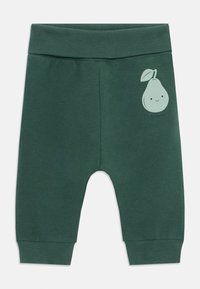 Zelené nohavice jogger z bavlnenej zmesi s rebrovaným pásom. Na ľavom stehne je potlač smiešneho hruškového dizajnu. Ankle cuffs sú rebrované.