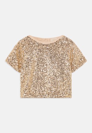 T-shirt de manga curta em sequins dourados com decote redondo e forro bege suave. O tecido tem uma superfície texturada e brilhante.