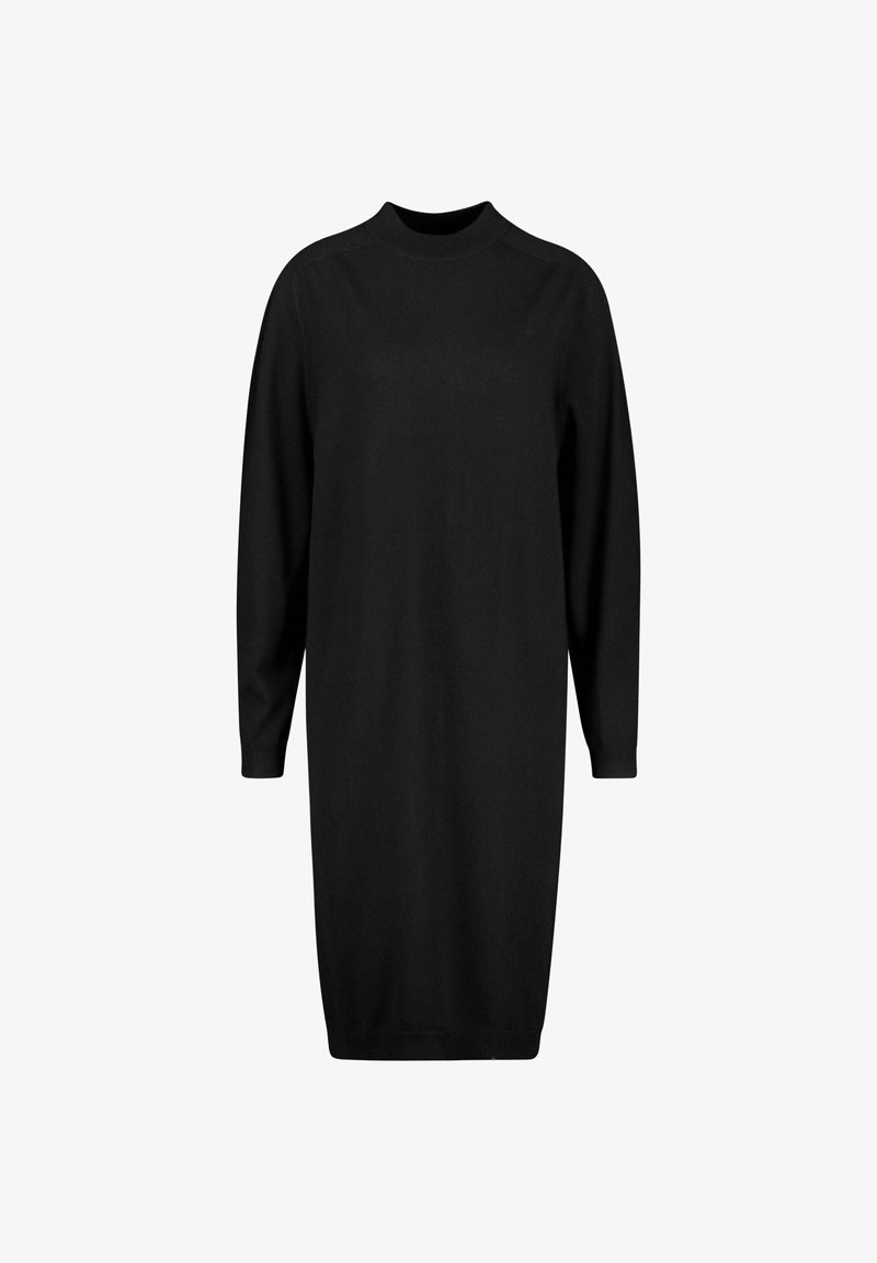 Vestido de malha preto com decote alto e mangas longas, de corte solto e reto que chega até a metade da coxa. Textura suave.