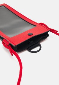 Nike Sportswear PREMIUM PHONE CROSSBODY UNISEX - Mobiilitasku - red/white