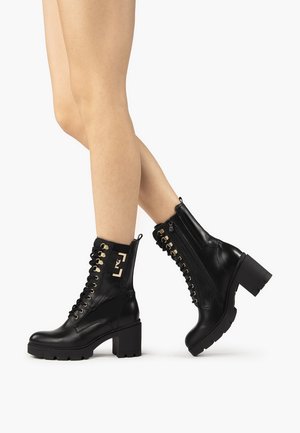 Bottines à lacets - black