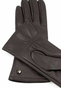 Brown leather gloves featuring a gathered design at the wrist and a logo accent. Smooth texture with snug-fitting fingers and wrist.