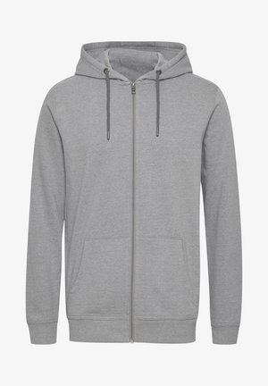 Grijze zip-up hoodie met een trekkoordkap, voorzakken, geribbelde manchetten en een zachte textuur. Eenvoudig ontwerp zonder patronen of accenten.