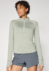 New Balance ATHLETICS GRID 1/2 ZIP - Hosszú ujjú felső - garter snake heather