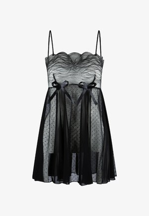 Robe noire avec un col festonné, fabriquée en tissu texturé transparent et ornée de motifs à pois. Comprend deux nœuds à la taille et des fines bretelles.
