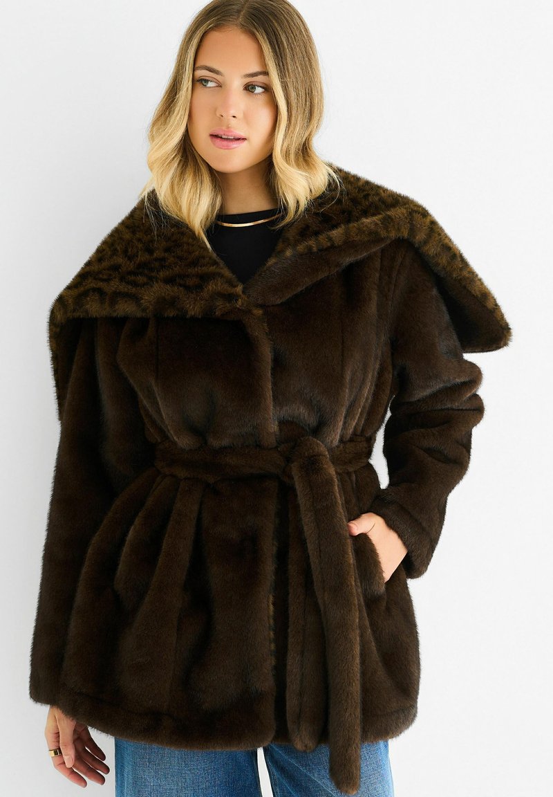 Brown faux fur coat with a large leopard-print collar, belted waist, and plush texture. Features side pockets and a relaxed fit.