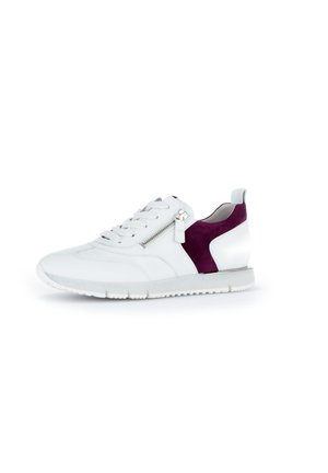 White leather sneaker with a maroon suede accent, lace-up design, side zipper detail, and a textured rubber sole.