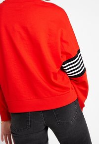 Noisy May Sudadera - red