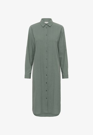 Dolga majica na gumb iz strukturiranega zelenega blaga s ovratnikom in ukrivljenim robom; vsebuje gumbe po sprednji strani in rokavih.