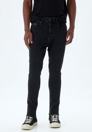 JUSTIN SUPER - Vaqueros slim fit - black