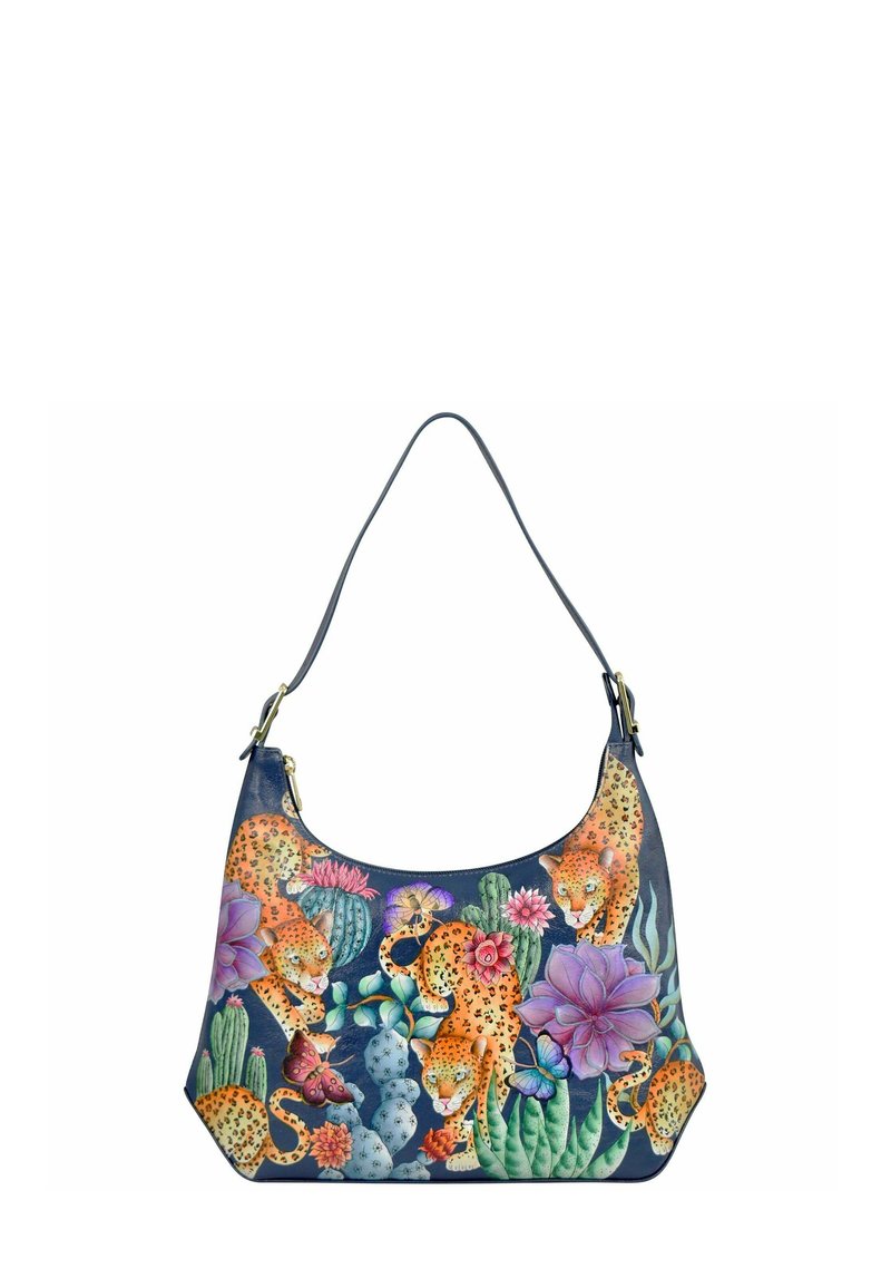 Hobo tas in donkerblauw leer met een all-over print van leopard, cactussen en bloemen. Enkele schouderband en accenten in goudkleurig metaal.