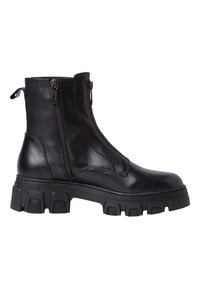 Botte cheville en cuir noir avec semelle crantée épaisse, deux fermetures éclair latérales et une languette au talon, conçue pour un port à la fois robuste et stylé.