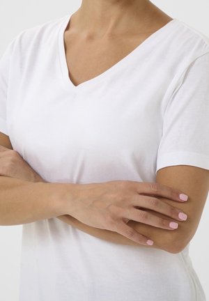 Biały bawełniany T-shirt z dekoltem w serek i krótkimi rękawami, o gładkiej fakturze i prostym, klasycznym stylu.