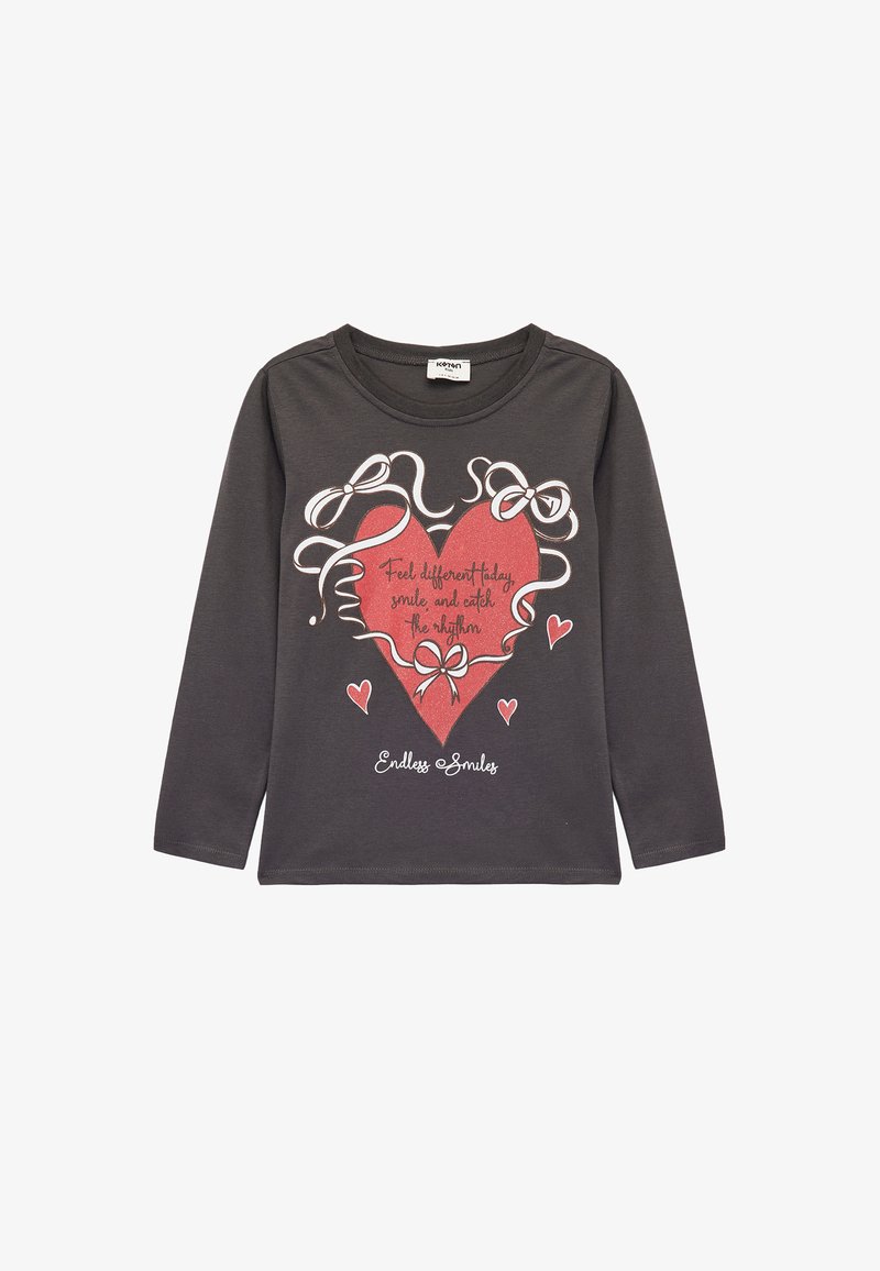 Long-sleeve, dark gray t-shirt with a heart graphic in red, white ribbons, and text reading "Endless Smiles" in white and red.