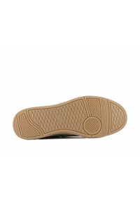 Suola di scarpa con superficie in gomma testurizzata, caratterizzata da un disegno del battistrada a motivo in colore beige, che offre aderenza e durata.