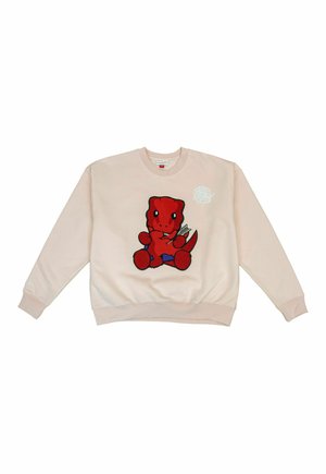 Beige sweatshirt with a red cartoon dinosaur holding wheat, ribbed cuffs and hem, and a small white emblem near the neckline.