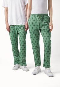 Carlo Colucci TRACKSUIT PANT UNISEX - Tréningruha alsók - light green