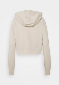 Felpa corta beige in tessuto morbido, con cappuccio regolabile con coulisse, maniche lunghe e polsini a costine. Design minimalista senza motivi.