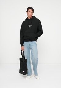 Tommy Jeans STAR GRAPHIC HOODIE UNISEX - Sportska majica - black
