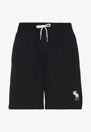 Shorts casual noirs avec taille élastique, cordon blanc et petit logo élan blanc sur la partie inférieure gauche de la jambe.