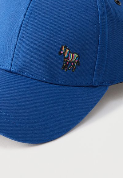 Μπλε καπέλο με υφασμάτινη υφή, καμπυλωτό γείσο και κεντημένο πολύχρωμο σχέδιο ζέβρας στο μπροστινό μέρος.