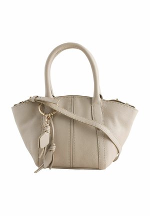 Beige leather handbag with two handles, a detachable shoulder strap, and a decorative tassel. Features textured surface and gold hardware accents.