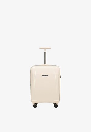 Valigia rigida compatta beige con quattro ruote nere rotanti e maniglia telescopica bianca a forma di T estesa.