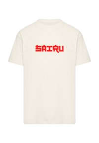 Cream T-shirt made of cotton with short sleeves, featuring a prominent red graphic text "SAIRU" across the chest.