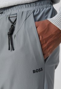 BOSS Tracksuit bottoms - dark beige