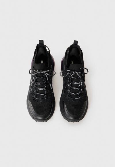 Black athletic shoes with mesh upper, reinforced toe, and purple accents. Features elastic laces with branding, cushioned sole, and pull tab.