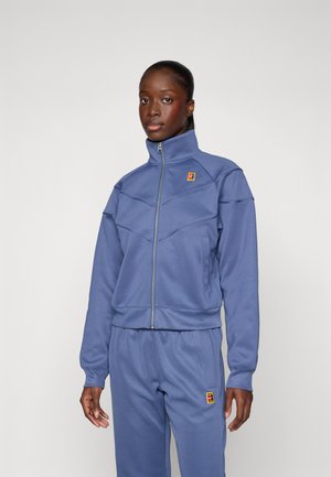 NIKECOURT JACKET HERITAGE - Bluză de trening - diffused blue