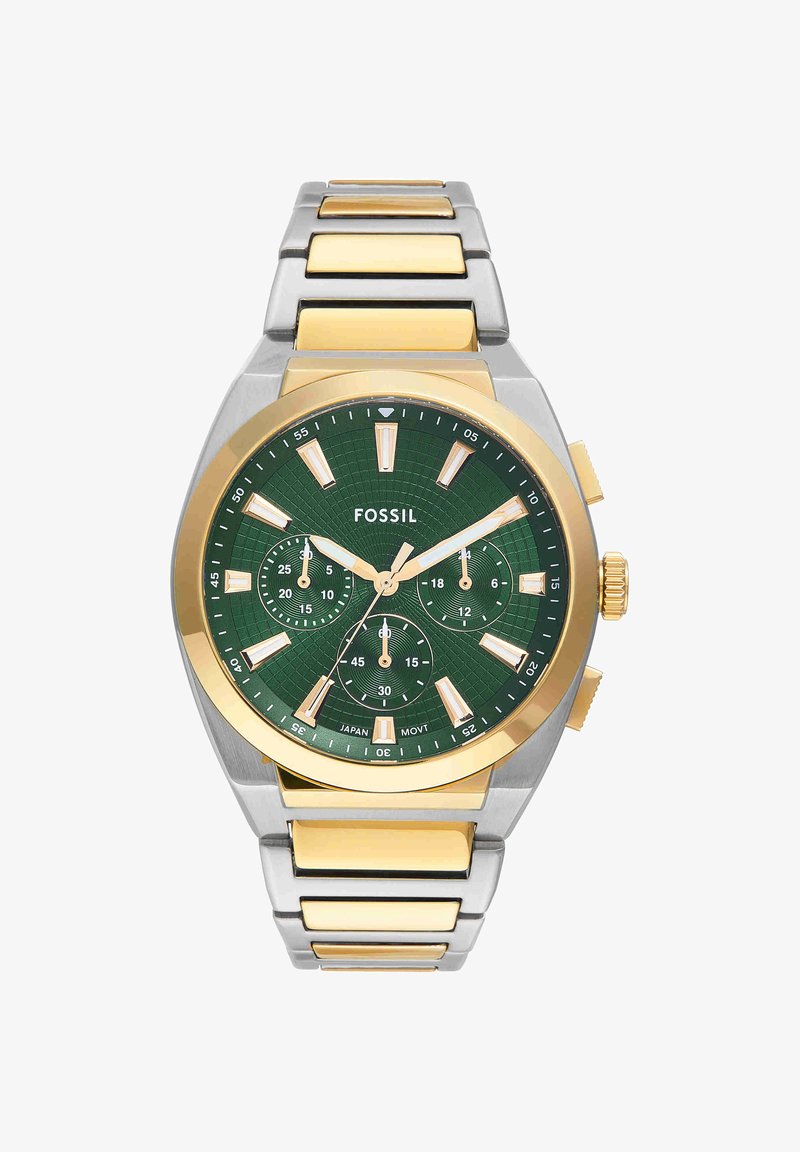 Montre-bracelet pour homme Fossil avec cadran vert, index dorés, trois sous-cadrans, bracelet en acier inoxydable doré et argenté, et lunette dorée.