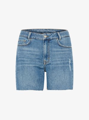 Heled sinised teksapüksid kõrge vöökohaga, kulunud detailide ja lõdva äärega. Omab kahte esimest taskut ja hõbedast nööbiga sulgemist.