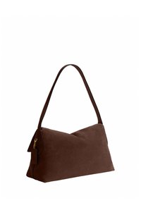 Brown suede handbag with single stitched shoulder strap and a small tag attached to the side, displayed on a white background.