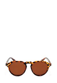 Kulaté sluneční brýle s želvovinovým rámem a hnědými skly. Disponují kontrastním stříbrným akcentem na spáncích a hladkým povrchem.