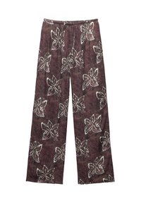 Pantaloni a gamba larga in un tessuto di un viola scuro con grandi motivi floreali bianchi. Vita elastica con cordoncino per una vestibilità regolabile.