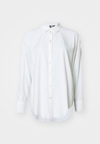 Chemise blanche à manches longues avec col et poignets, vue de face sur fond blanc uni.