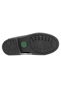 Suela de zapato de goma negra con superficie texturizada, que presenta patrones de banda de rodadura circulares y un acento central verde con información de tallas.