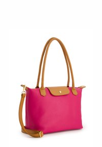 Pink leather tote bag with tan leather handles and a clasp. Features a textured finish and an adjustable shoulder strap.