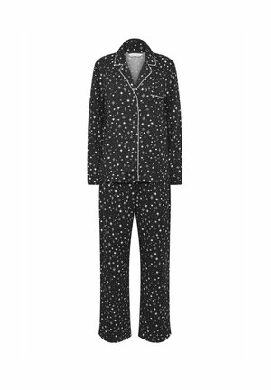 Ensemble de pyjama noir à manches longues avec boutons, motifs d'étoiles et de croissant de lune blancs, avec passepoil blanc le long du col et de la poche.